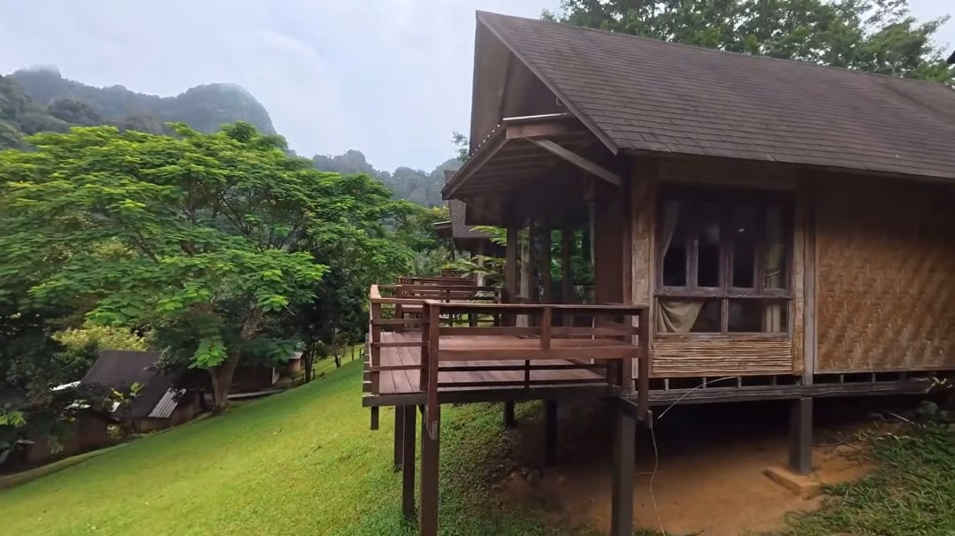 A stilted bungalow at The Cliff & River Resort in Khao Sok